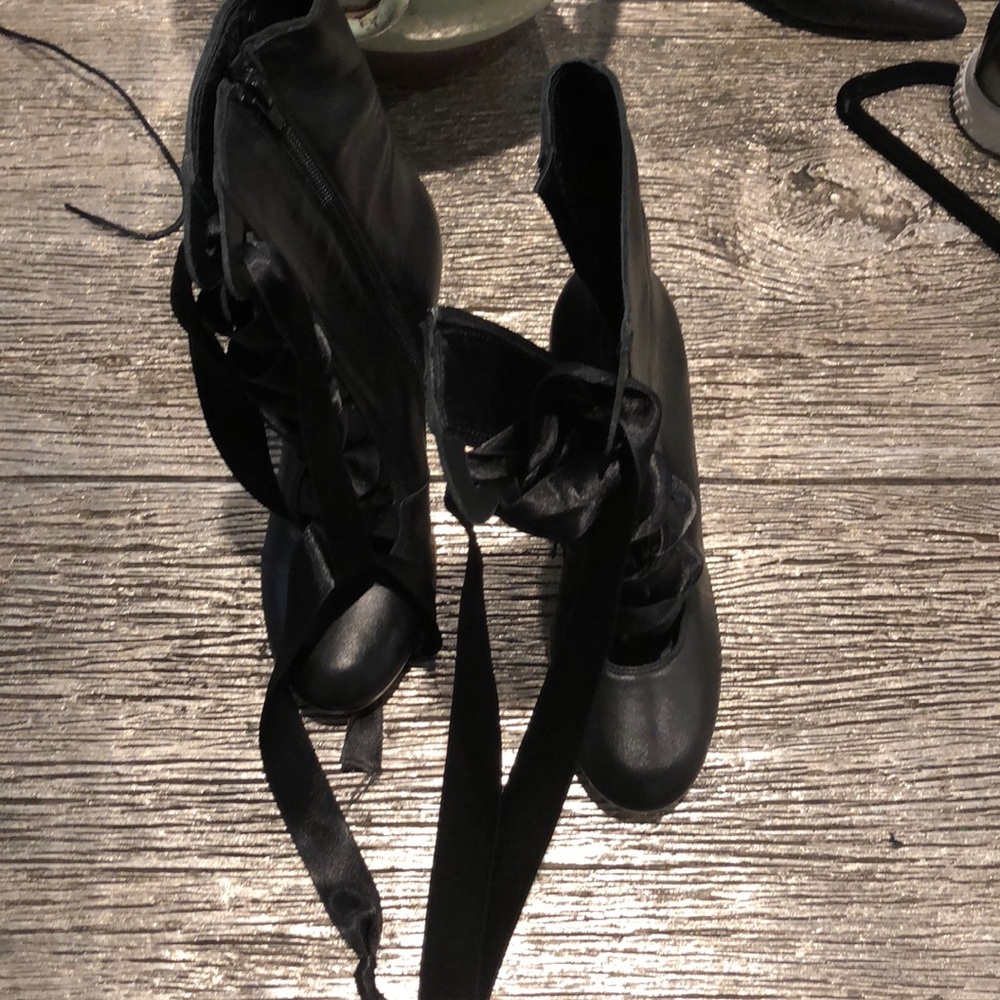 Italian lace-up leather booties.